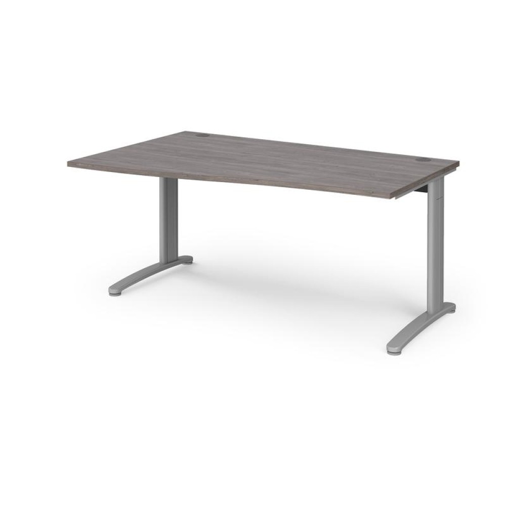 TR10 left hand wave desk 1600mm - silver frame, grey oak top